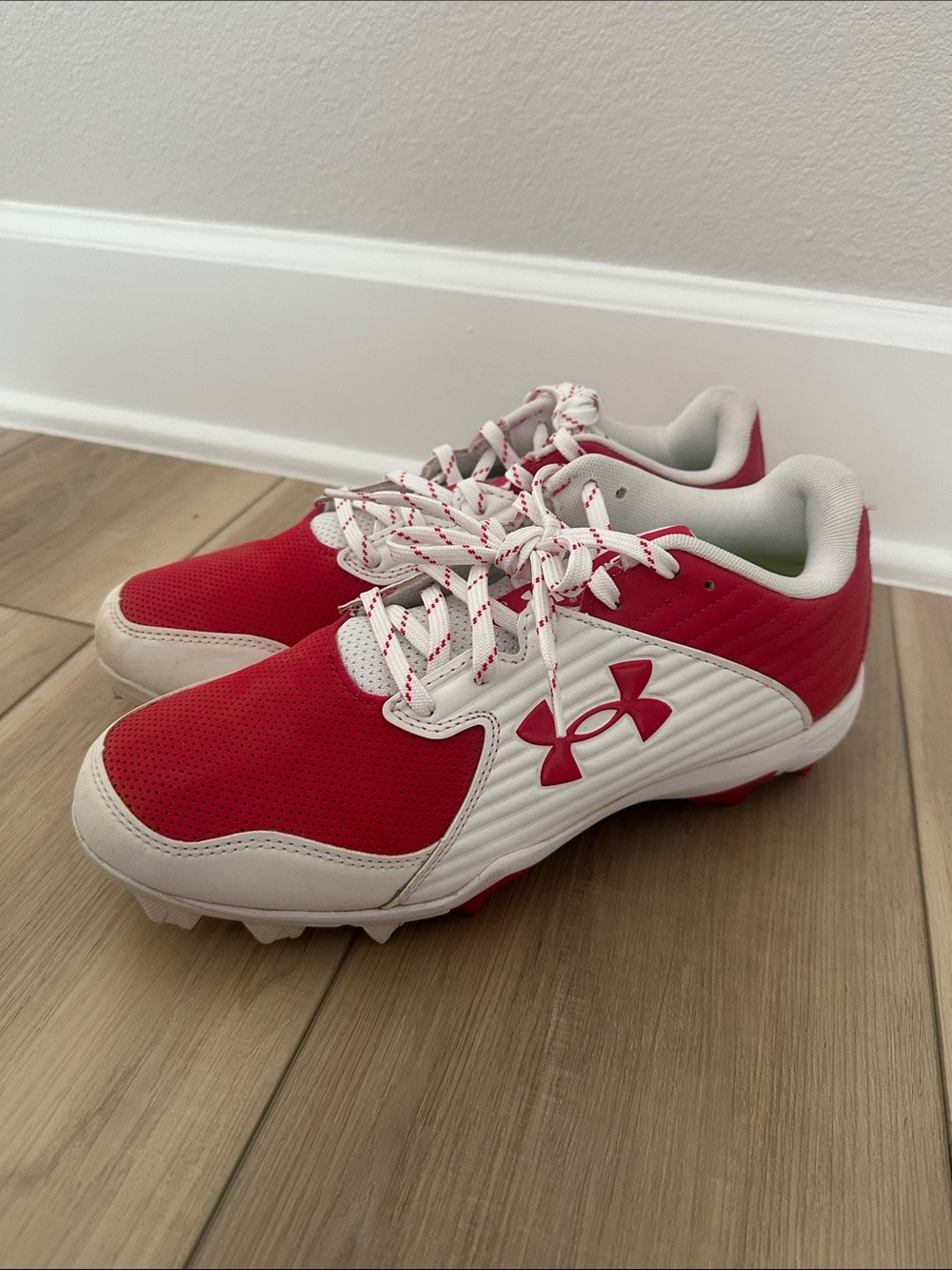 Under Armour Red and White Youth Athletic Cleats